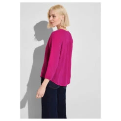 Street One Damen 3/4 Arm Bluse Musselin Buttoned Roundneck Magnolia Pink 9 Street One Damen 3/4 Arm Bluse Musselin Buttoned Roundneck Magnolia Pink -Wellensteyn Shop street one muslin shirt dress solid blusenkleid rosa 15755 model hinten